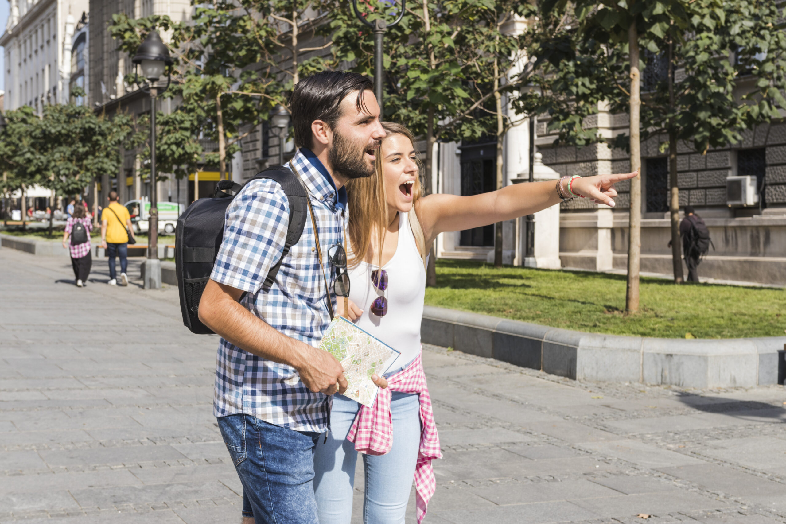woman-showing-something-her-boyfriend-while-enjoying-vacation